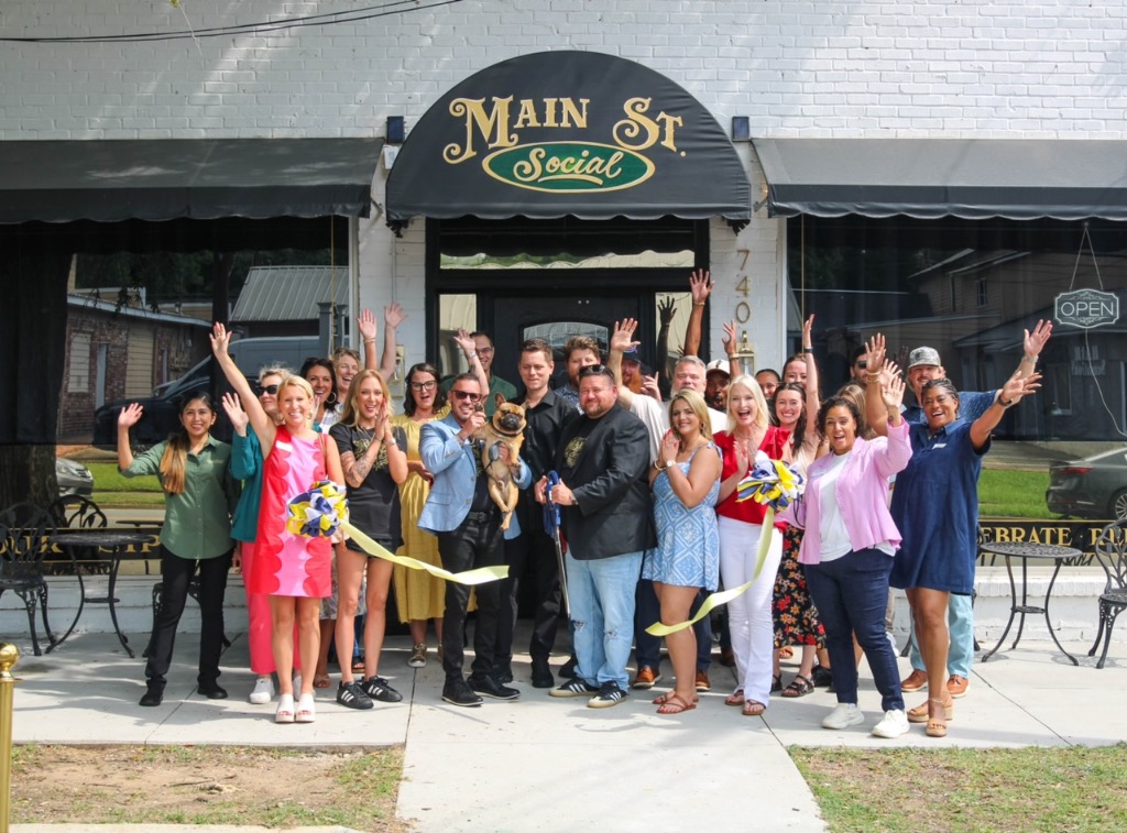 Main Street Social Grand Opening ribbon cutting with community